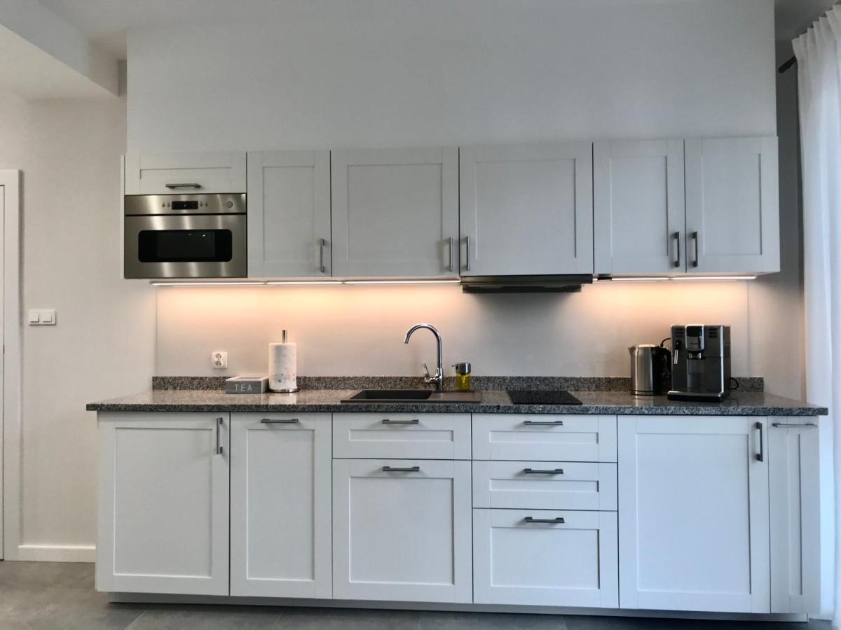 Apartamenty Porto Eli 罗威 外观 照片