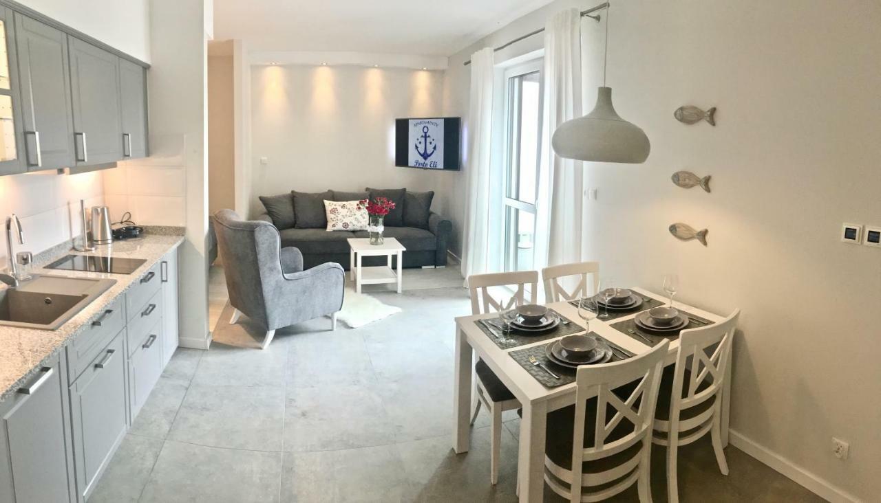 Apartamenty Porto Eli 罗威 外观 照片