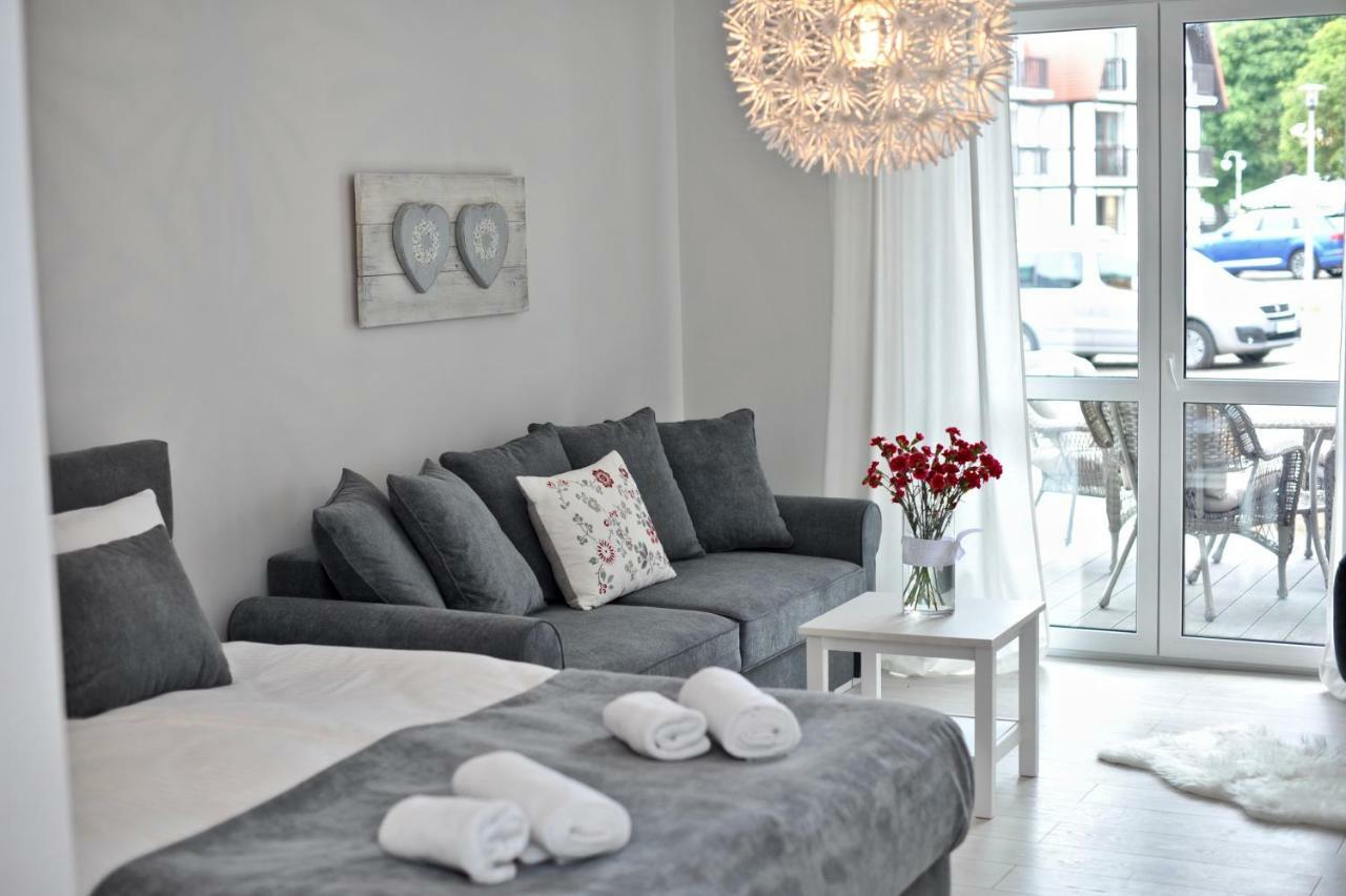 Apartamenty Porto Eli 罗威 外观 照片